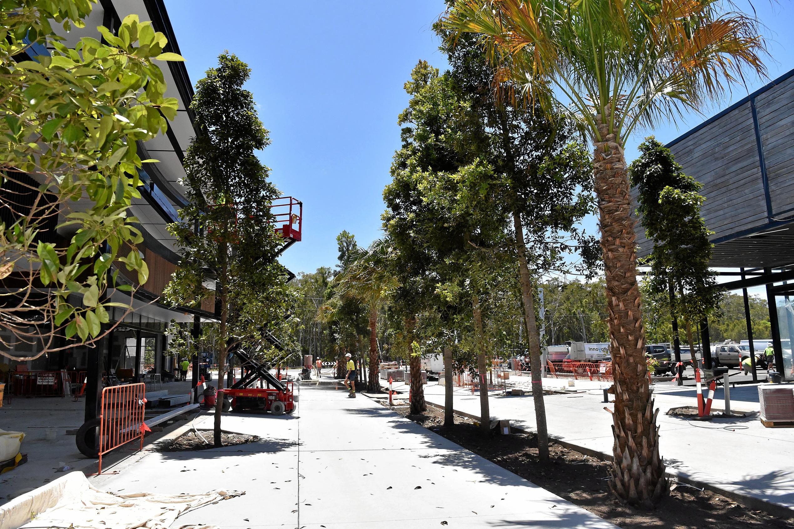 Full steam ahead for the opening of the Stockland Birtinya Shopping Centre. Constuction workers put the final pieces together for the grand opening in a couple of weeks. Picture: Warren Lynam