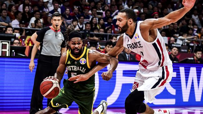 Patty Mills on the attack during Australia’s heartbreaking loss to France. Picture: Di Yin/Getty Images