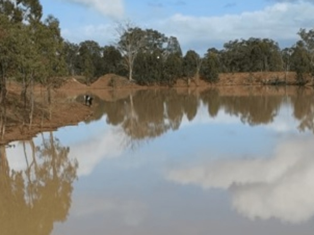 Police released images of divers searching a body of water as they continue their search for Jack McLennan, who disappeared near Ficks Crossing at Murgon 12 days ago.