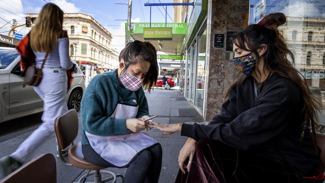 Getting your nails done in the street will be a thing of the past from Friday. Picture: NCA NewsWire / David Geraghty