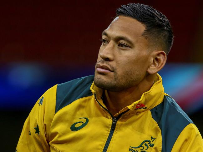 (FILES) In this file photo taken on November 9, 2018, Australia's wing Israel Folau attends the captain's run training session at the Principality stadium in Cardiff, south Wales, on the eve of their autumn international rugby union match against Wales. - Sacked Wallabies fullback Israel Folau launched legal action on June 6, 2019 against Rugby Australia's decision to dismiss him over homophobic social media posts, saying he was seeking "substantial remedies" from the governing body. Folau's contract was terminated in May after a Rugby Australia tribunal found him guilty of a "high-level" code of conduct breach for posting on social media that "hell awaits" gay people and others he considers sinners. (Photo by GEOFF CADDICK / AFP) / RESTRICTED TO EDITORIAL USE -use in books subject to Welsh Rugby Union (WRU) approval