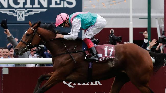 Jockey Frankie Dettori guides Enable to win the 96th Prix de l'Arc de Triomphe.