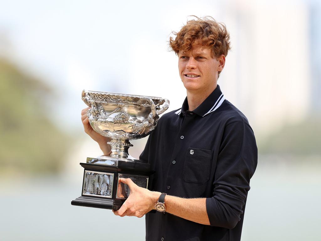 Jannik Sinner poses with the Norman Brookes Challenge Cup after winning the 2025 Australian Open. He has since accepted a three-month doping ban. Picture: Getty Images