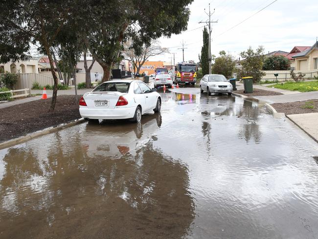 The flooding on Reece Avenue, Klemzig from Tuesday morning’s burst morning. Picture: Stephen Laffer