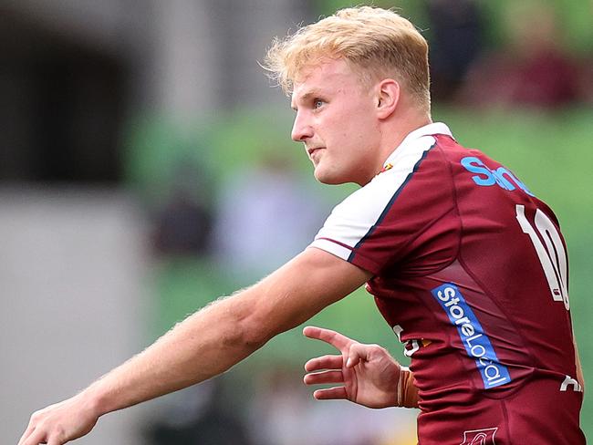 MELBOURNE, AUSTRALIA - MARCH 03: Tom Lynagh of the Reds kicks during the round two Super Rugby Pacific match between Hurricanes and Queensland Reds at AAMI Park, on March 03, 2024, in Melbourne, Australia. (Photo by Kelly Defina/Getty Images)