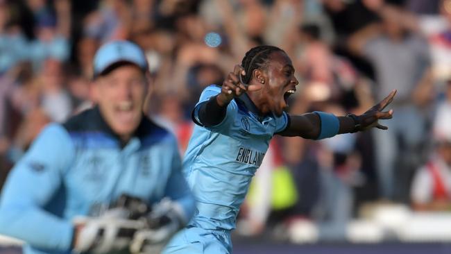 England’s Jofra Archer (right) celebrates with teammate Jos Buttler after claiming victory in the World Cup final. Picture: AFP