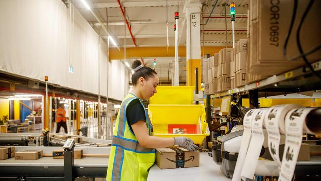 A woman packs a delivery. Picture: NewsWire / Nikki Short