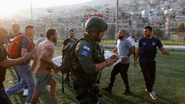 Young people were killed and wounded after a rocket fired from Lebanon had hit the town of Majdal Shams in the Israeli-annexed Golan Heights, Israel says. Picture: AFP