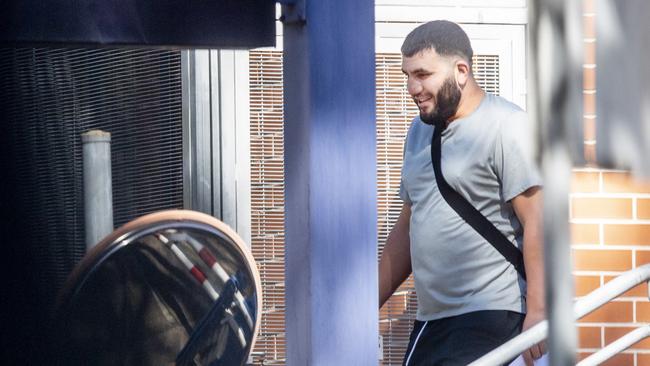 Ali Elmoubayed is pictured reporting to a police station in western Sydney this week after recently being granted bail as he awaits trial.