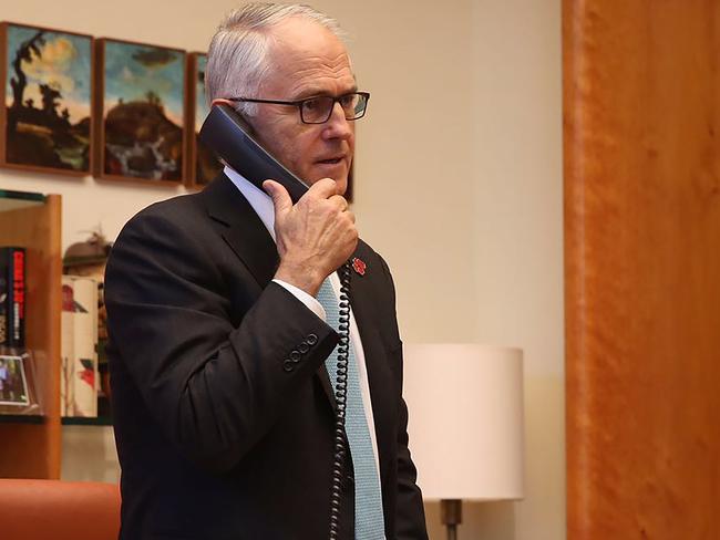 Prime Minister Malcolm Turnbull talking on the telephone to US President-elect Donald Trump. Picture: Prime Minister’s Office