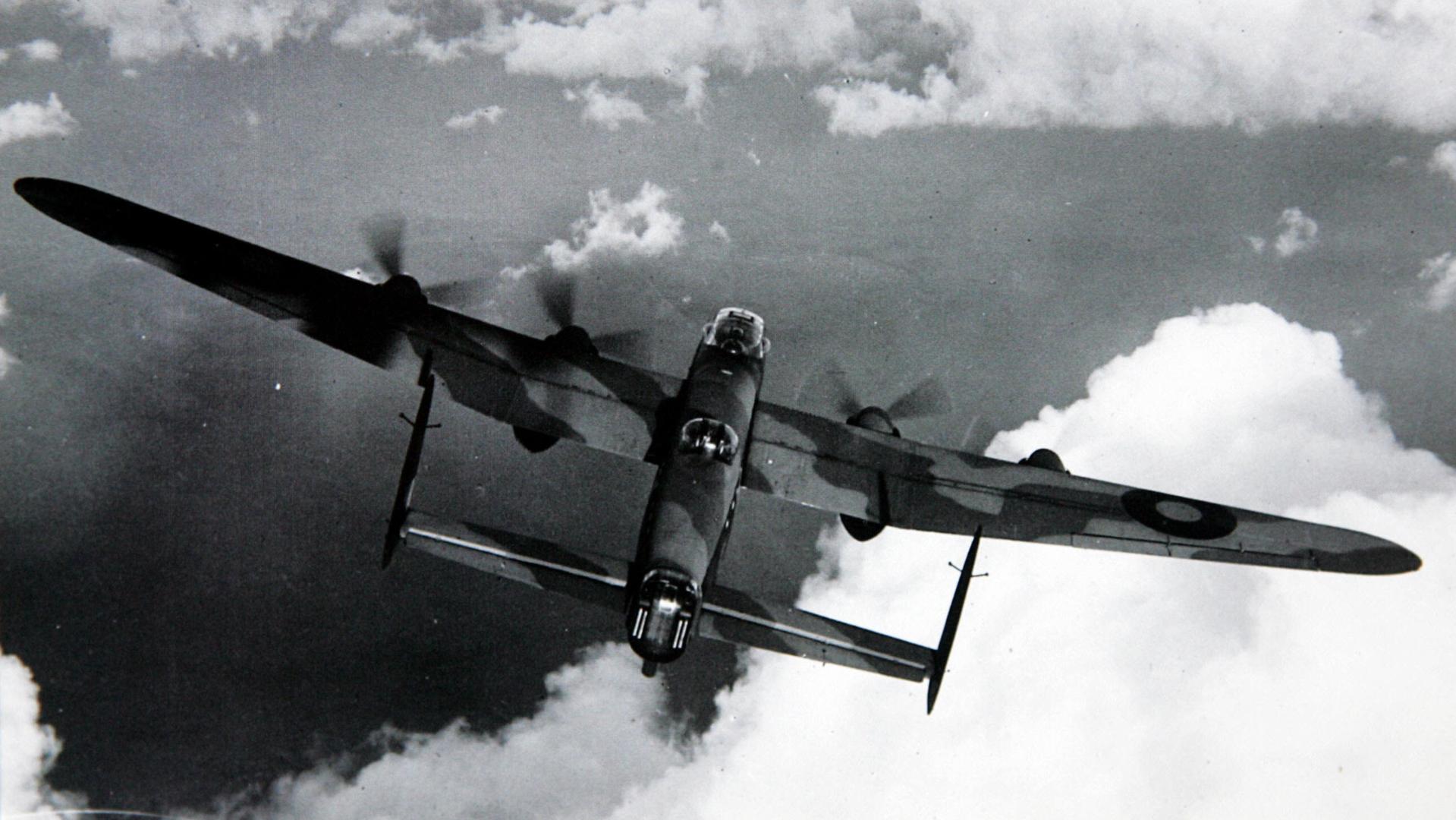 British world war two Lancaster bomber aeroplane in flight. second historical/Aeroplanes