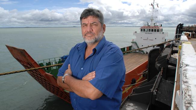 Arthur Hamilton with his barge the MV Robert Ladlow.