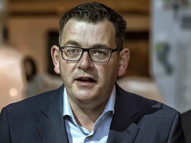 Victorian Premier Daniel Andrews (with Health Minister Jill Hennessy) holds a press conference at the Royal Children's Hospital in Melbourne, Sunday, April 8, 2018. Premier Andrews announced an extra $50 million will be provided for Victoria's public hospitals to deal with the upcoming flu season. (AAP Image/Luis Ascui) NO ARCHIVING