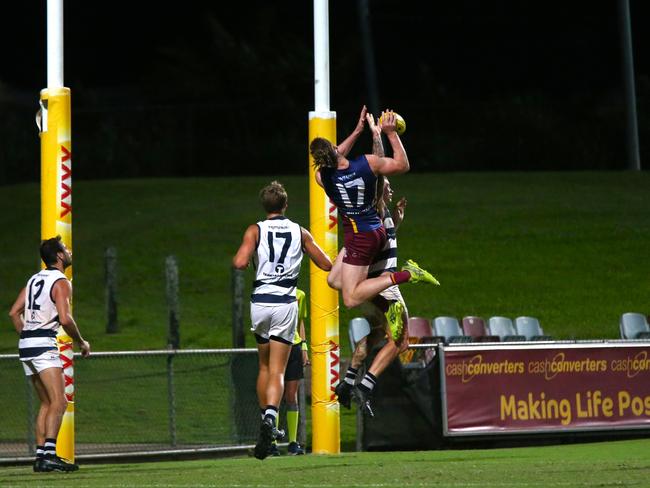 Pictured (l-r): Crocs Brett Mckeown, Brae Agrums and Lion Matt Eagles. Cairns City Lions v Port Douglas Crocs at Cazalys Stadium. Elimination Final. AFL Cairns 2024. Photo: Gyan-Reece Rocha