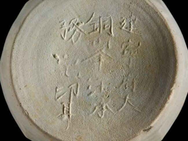 An inscribed piece of pottery recovered from the shipwreck site. Picture: The Field Museum