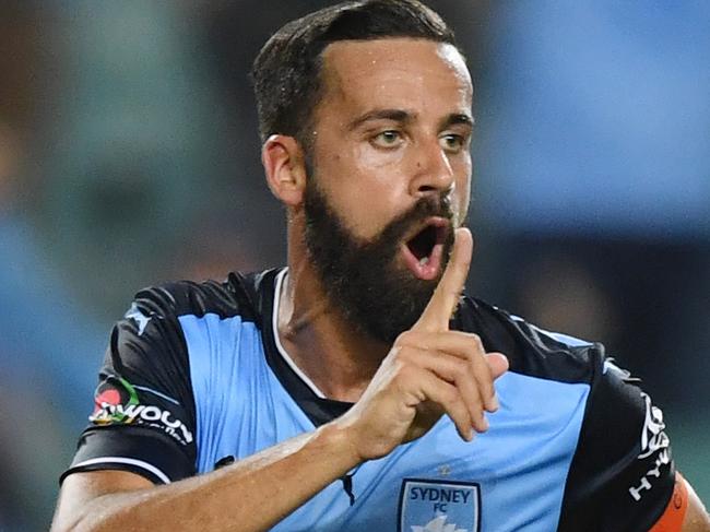 Alex Brosque of Sydney (left) gestures after scoring a goal during the A-League round 11 football match between Sydney FC and Melbourne City at the Allianz Stadium in Sydney, Friday, December 15, 2017. (AAP Image/David Moir) NO ARCHIVING, EDITORIAL USE ONLY