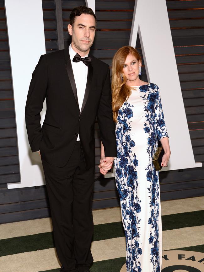 Sacha Baron Cohen and Isla Fisher arrive at the 2015 Vanity Fair Oscar Party. Picture: AP