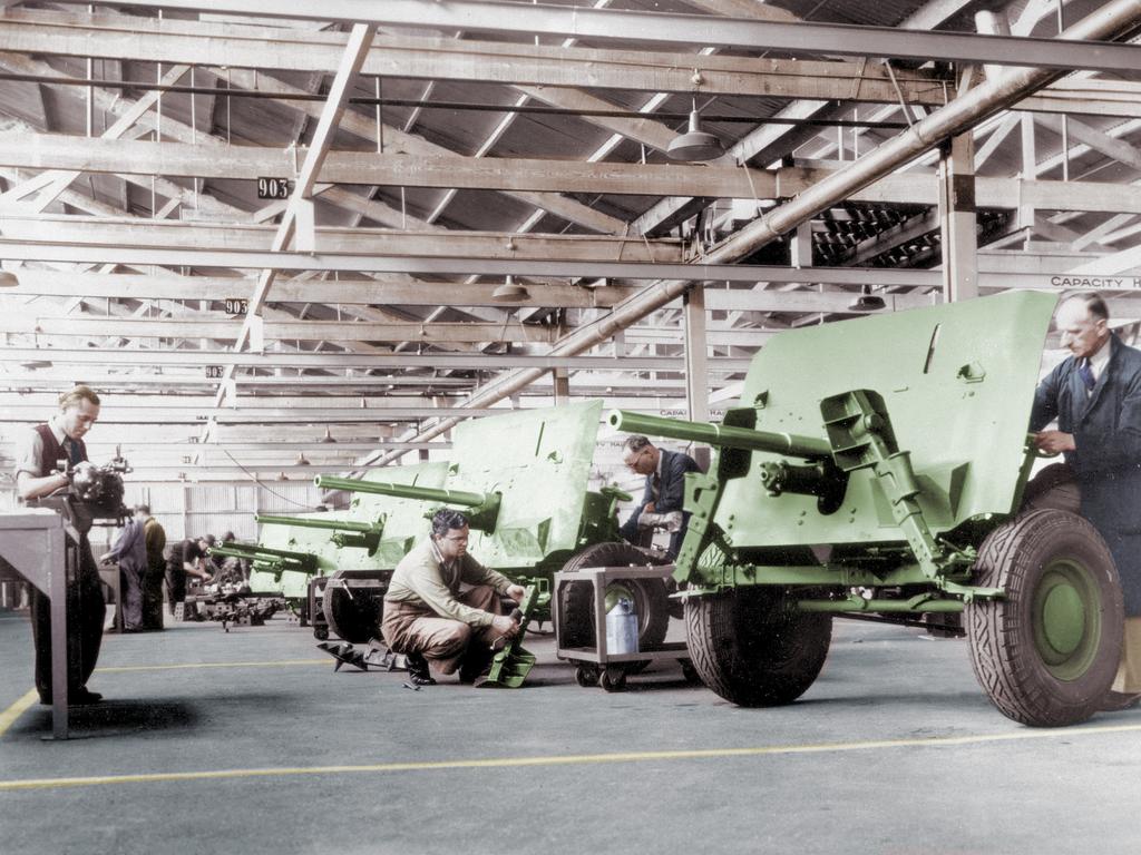 Workers at a Holden factory building anti-tank guns during World War II.