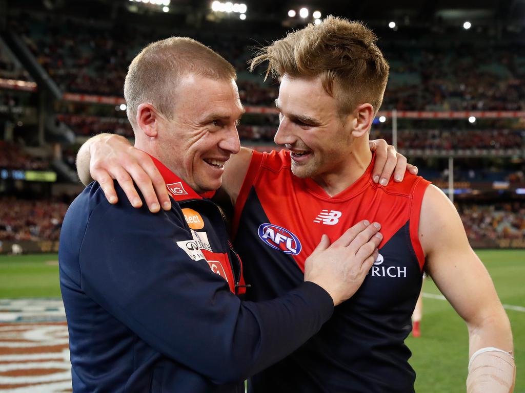 Goodwin celebrates his team’s semi-final win against Hawthorn with Dom Tyson. Picture: AFL Media/Getty Images