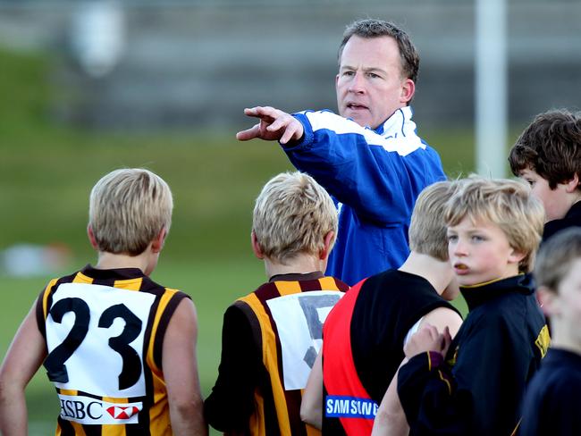 Tasmanian Leader of the Opposition Will Hodgman coaching the Sandy Bay Lions, his eldest son William's under 11 football team, Will talks to his players