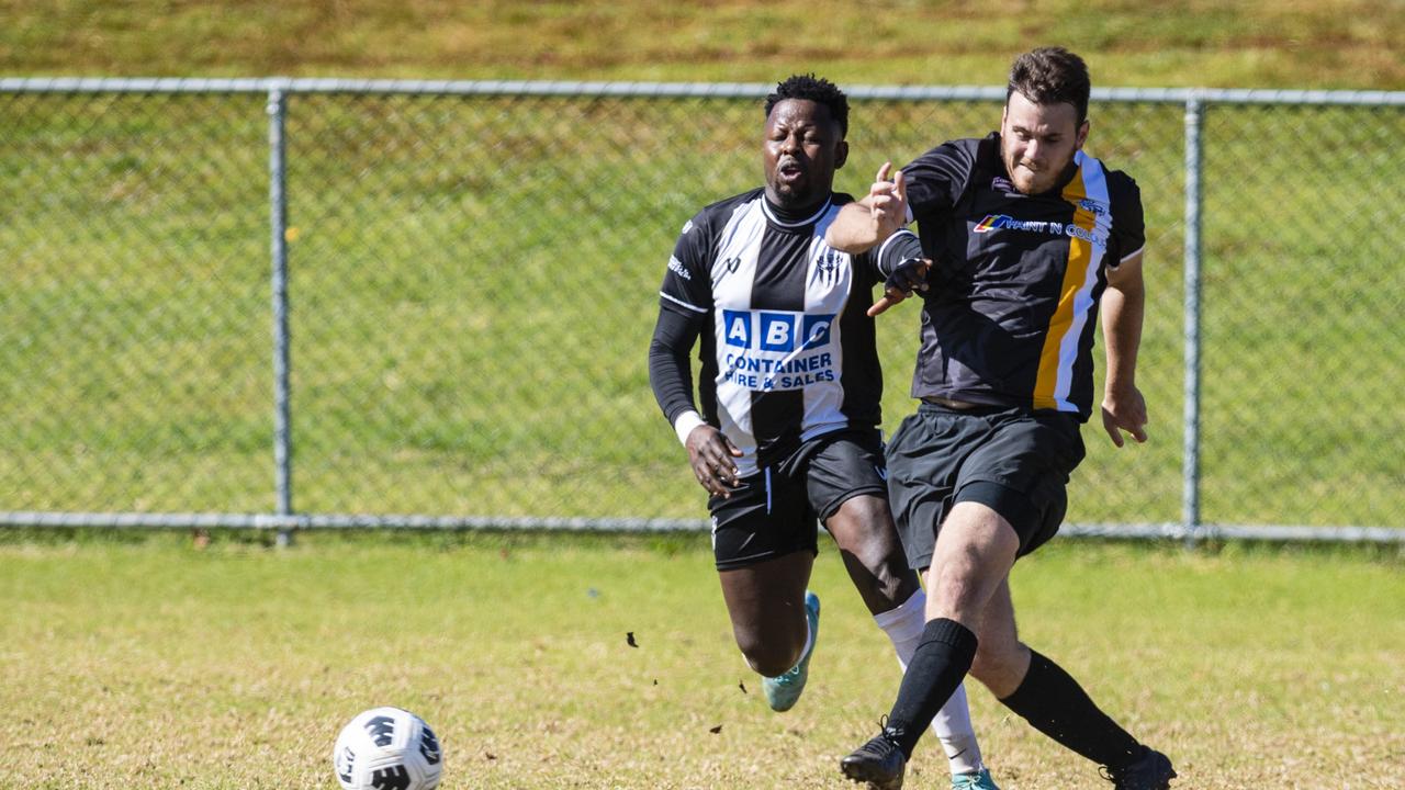 Peter Mayweather (left) of Willowburn and Lachlan Gray of West Wanderers in U23 men FQ Darling Downs Presidents Cup football at West Wanderers, Sunday, July 24, 2022. Picture: Kevin Farmer