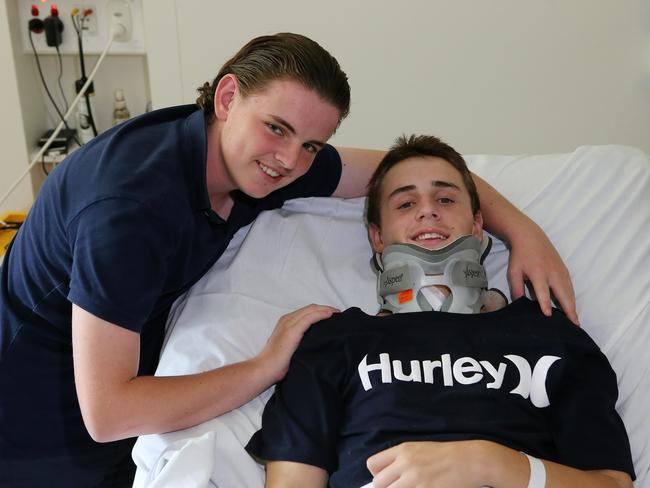 Will Murray in hospital with friend Finn Verberne. Picture: Yuri Kouzmin