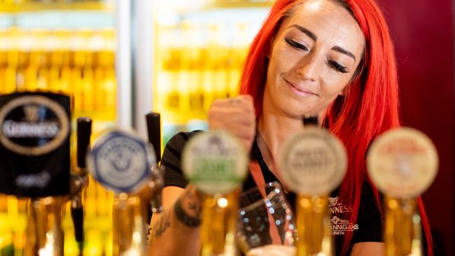 Emily Hazrati serves a pint of beer at Shenanigans as pubs reopened on May 15. PICTURE: CHE CHORLEY