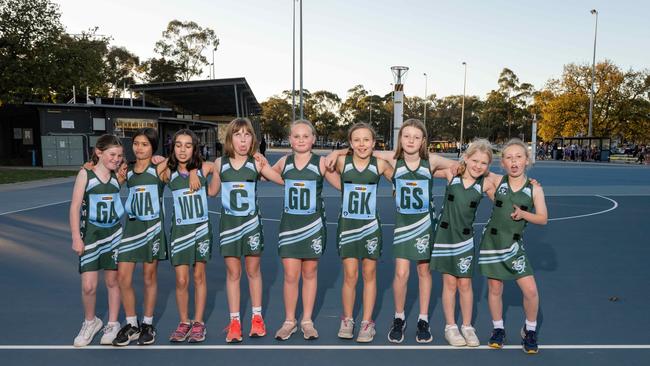Geelong Amateurs Rubies under-11 netball team pull their funniest faces.