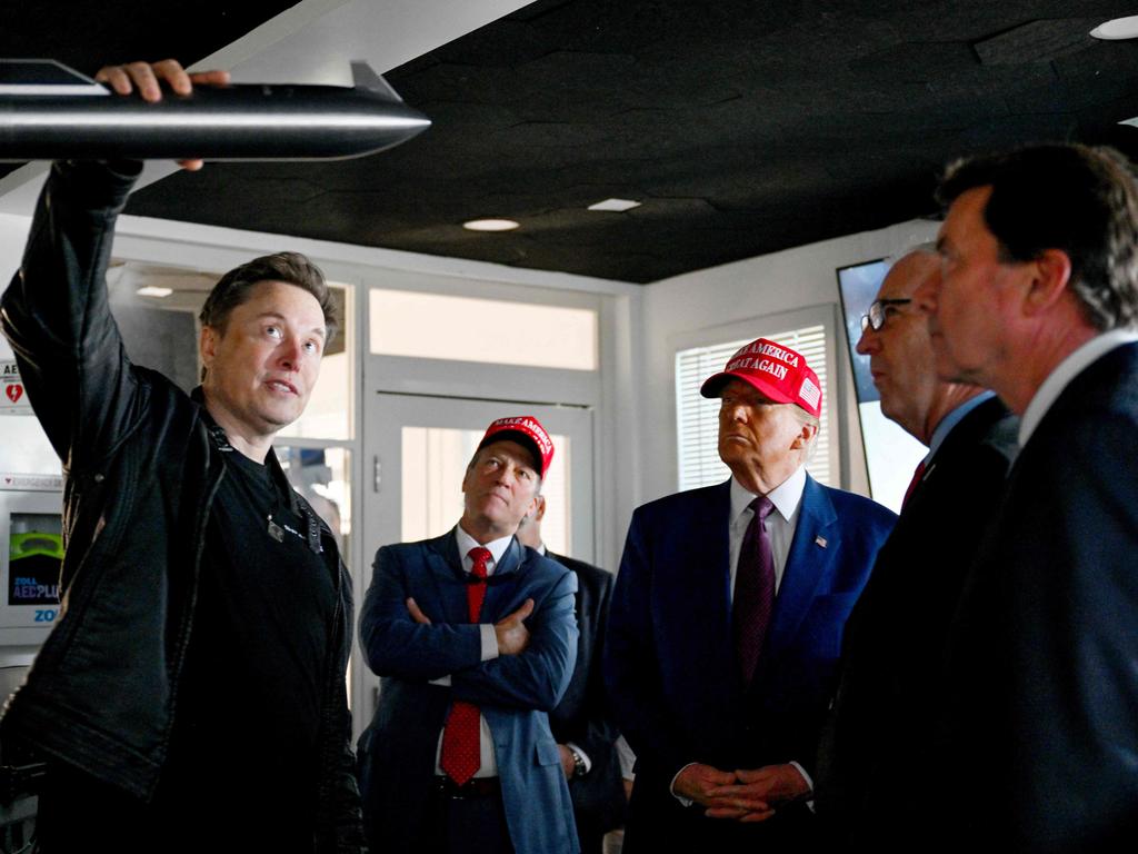 Elon Musk gives a tour to Donald Trump and other politicians of the control room before the launch of the sixth test flight of the SpaceX Starship rocket. Picture: Getty Images via AFP