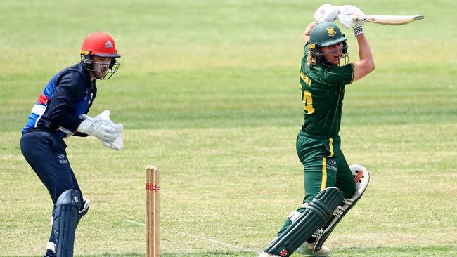 Tearan Gleeson bats for Northcote, while Dylan Kight wicketkeeps for Footscray. Picture: Josh Chadwick