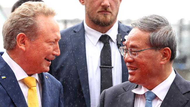 Mining magnate Andrew Forrest with Mr Li. Picture: AFP