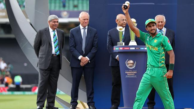 Pakistan's Hasan Ali holds up his ‘Golden Ball’ award as Champions Trophy’s leading wicket-taker.