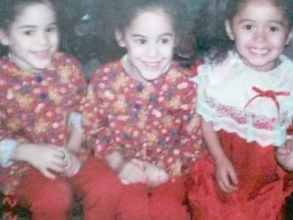 Amanda and Anna Ramirez, left and centre, as children. Picture: Supplied