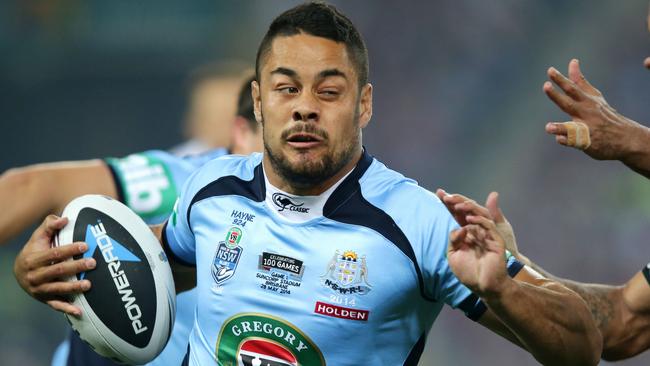 DTM State of Origin 2014 Jarryd Hayne takes on the defense during game 1 of the 2014 Origin series between the Queensland Maroons and the NSW Blues at Suncorp Stadium .Picture Gregg Porteous