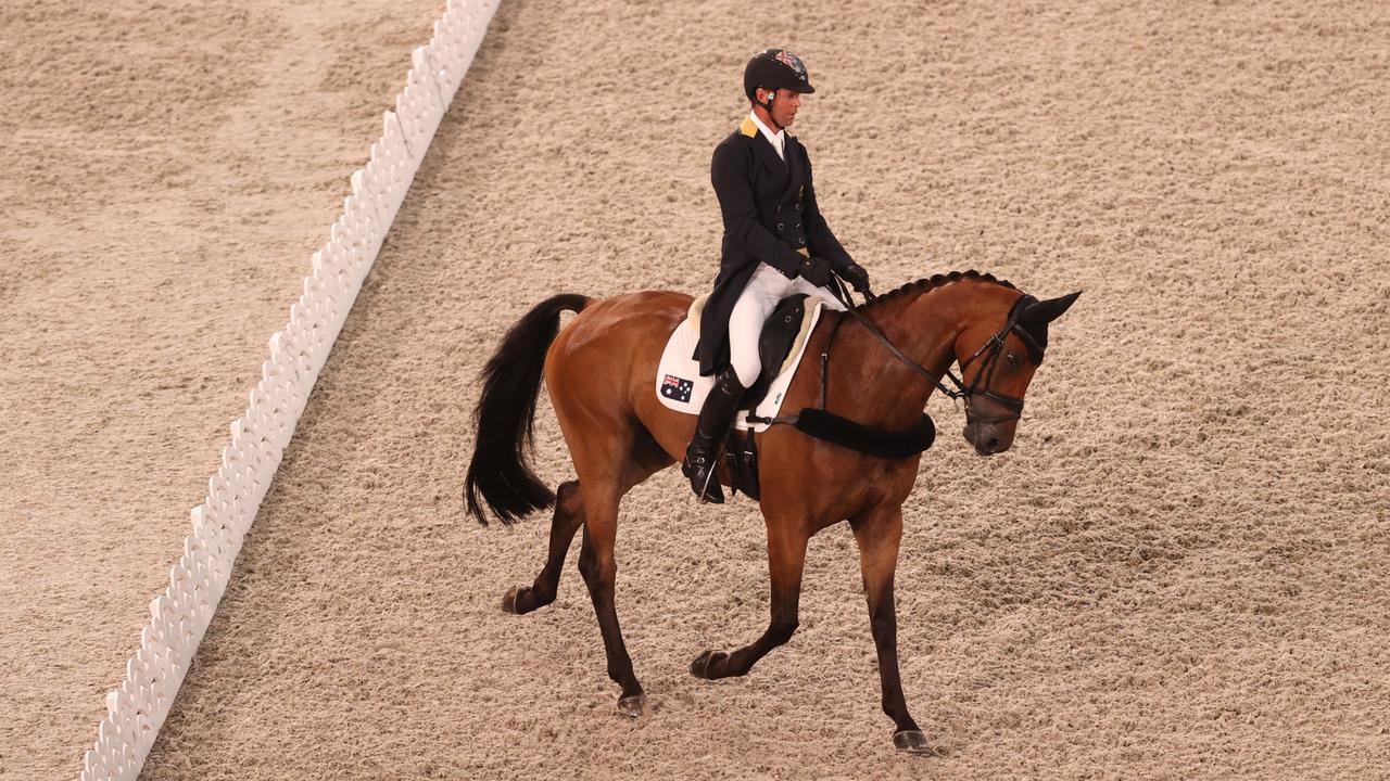 TOKYO, JAPAN - JULY 30: Stuart Tinney of Team Australia riding Leporis competes in the Eventing Dressage Team and Individual Day 1 - Session 2 on day seven of the Tokyo 2020 Olympic Games at Equestrian Park on July 30, 2021 in Tokyo, Japan. (Photo by Julian Finney/Getty Images)