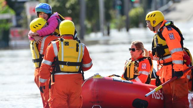 MELBOURNE, AUSTRALIA - OCTOBER 14TH, 2022: Maribyrnong Floods, Melbourne. Little girl being rescued by the SES at Raleigh Rd.Picture: Nicki Connolly