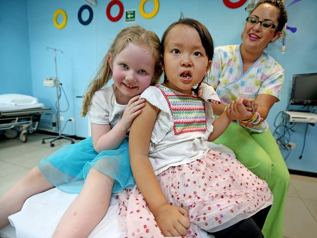 Australian girls Annabelle Potts and Annabelle Nguyen during a visit to the Clinica 0-19 in Monterrey Mexico. Picture: Nathan Edwards