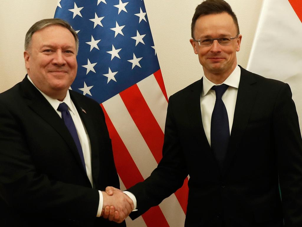 US Secretary of State Mike Pompeo shakes hands with Hungarian Foreign Minister Peter Szijjarto. Mr Pompeo aims to increase defence co-operation in Europe. Picture: Getty Images