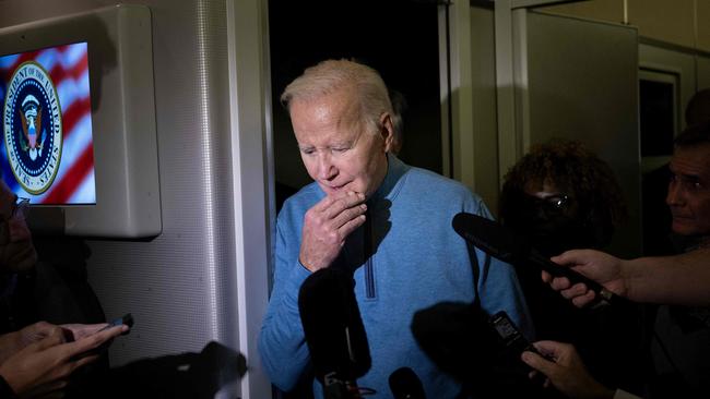 US President Joe Biden speaks to the press aboard Air Force One during a refueling stop at Ramstein Air Base as he returned from a visit to Israel.