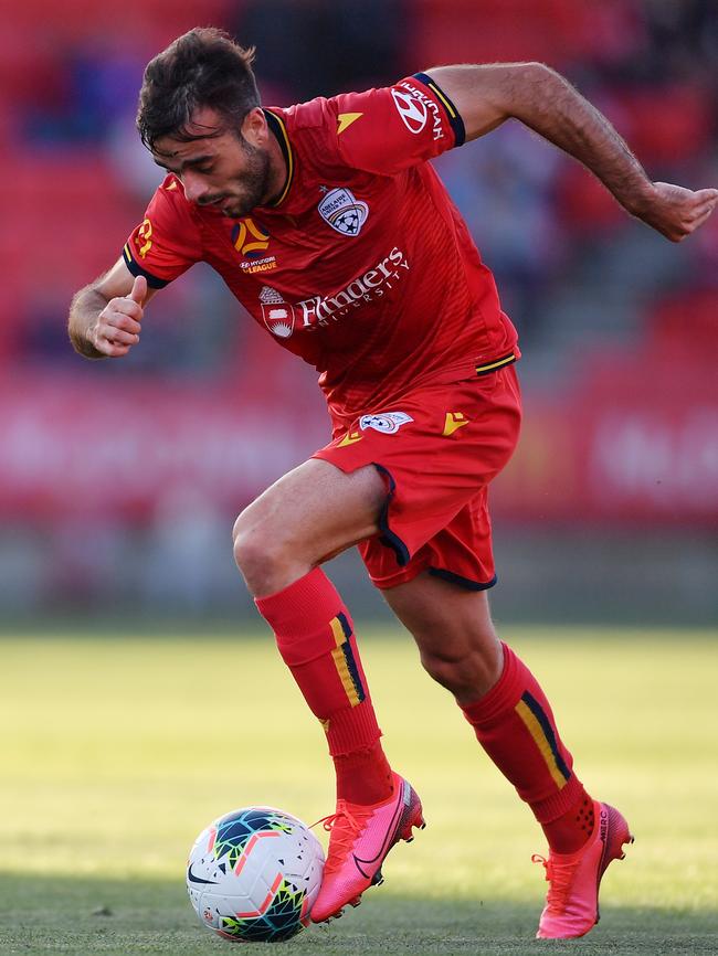 Nikola Mileusnic attempts to push Adelaide United into attack.