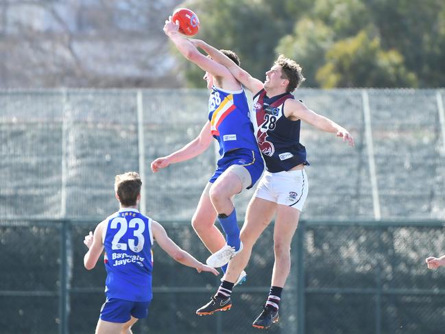 Riley Smith goes up in a ruck contest. Picture: James Ross/AAP