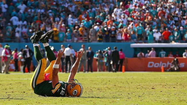Aaron Rodgers after throwing a touchdown against the Miami Dolphins.