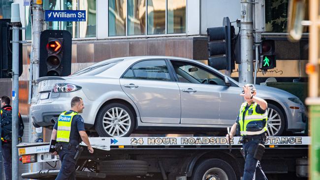 The car is towed from the scene. Picture: Jason Edwards