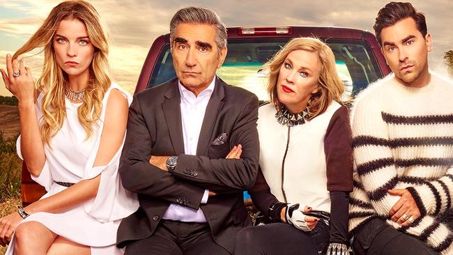 The cast of Schitt's Creek, streaming on Netflix.