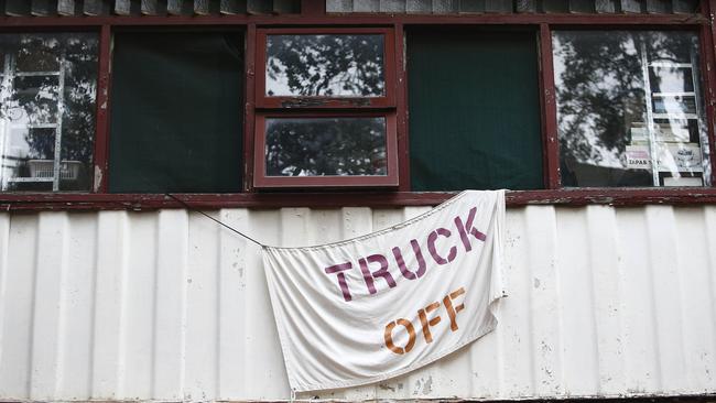 Signs along Bulkwara Street Ultimo in protest to the development work site in the street. Picture: John Appleyard
