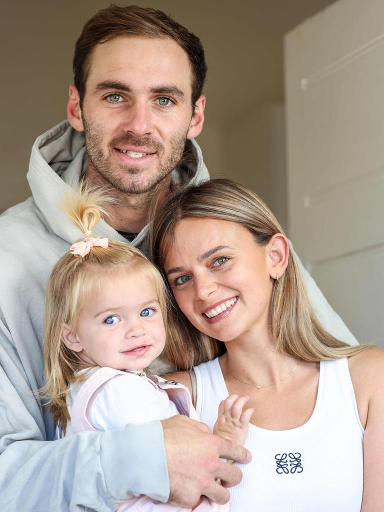 Finlayson with wife Kellie and daughter Sophia. Picture: Russell Millard