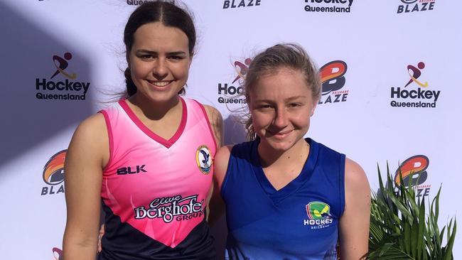 Tess Henare, left, of Toowoomba and Talicia Canty (Brisbane) scored goals.