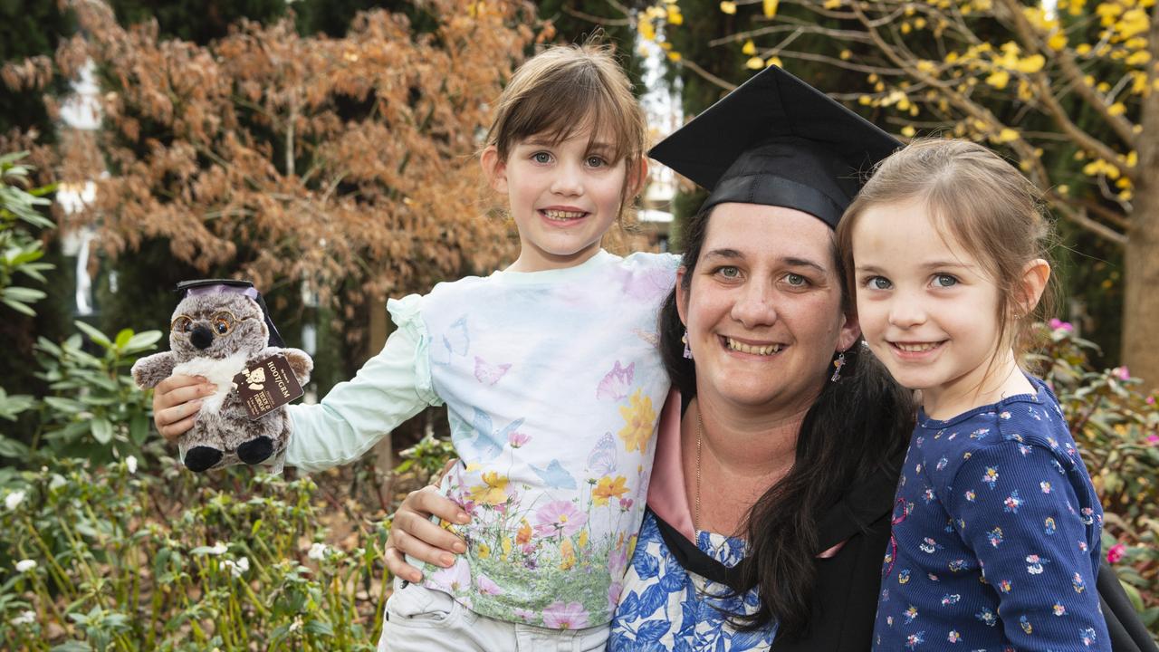 Bachelor of Education (Secondary) graduate Cheyanne Hall with daughters Bonnie (left) and Ivy Hall at a UniSQ graduation ceremony at The Empire, Tuesday, June 25, 2024. Picture: Kevin Farmer