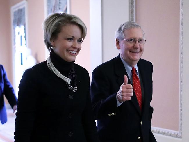 Senate majority leader Mitch McConnell (right) gives the thumbs-up, saying Republicans have the votes necessary to pass sweeping tax cuts. Picture: Chip Somodevilla/Getty Images/AFP