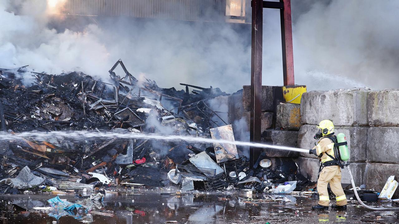 Firefighters are battling a large warehouse blaze, causing thick smoke to cover the Rockdale area. Picture: Sam Ruttyn